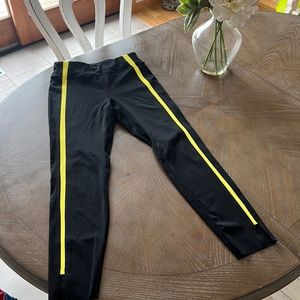 Sz 4 (but fits like 4-6) black Zyia leggings with yellow slimming stripe